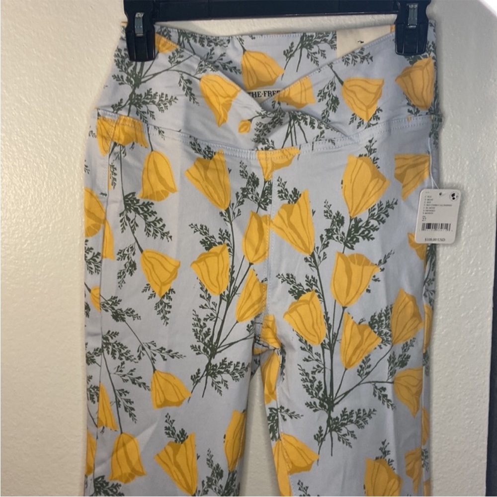 We The Free Venice Beach Floral Printed High Waist
Flare Leg Criss Cross Pants - Picture 4 of 9